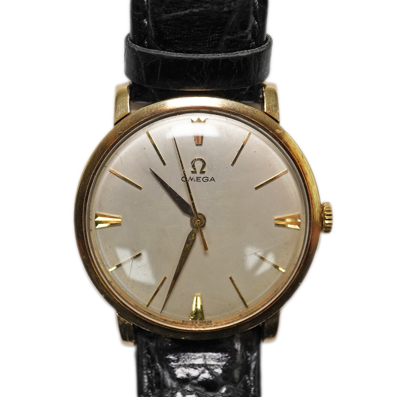 A gentleman's late 1950's 9ct gold Omega manual wind wrist watch